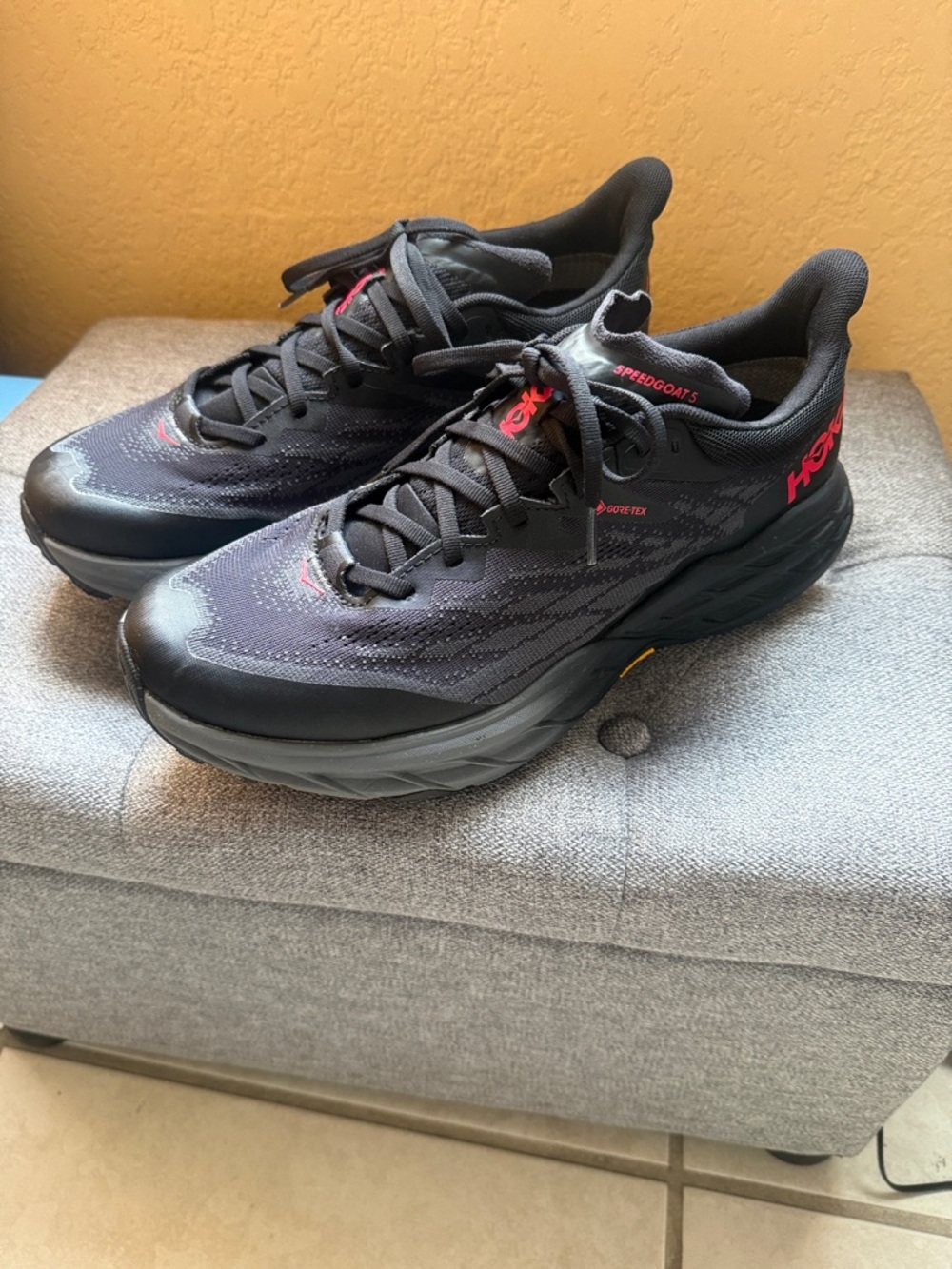 Hoka Black and Red Speedgoat Trail Running Shoes
